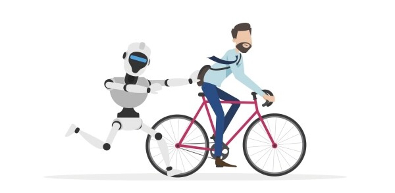 Man on bicycle is chased by robot.