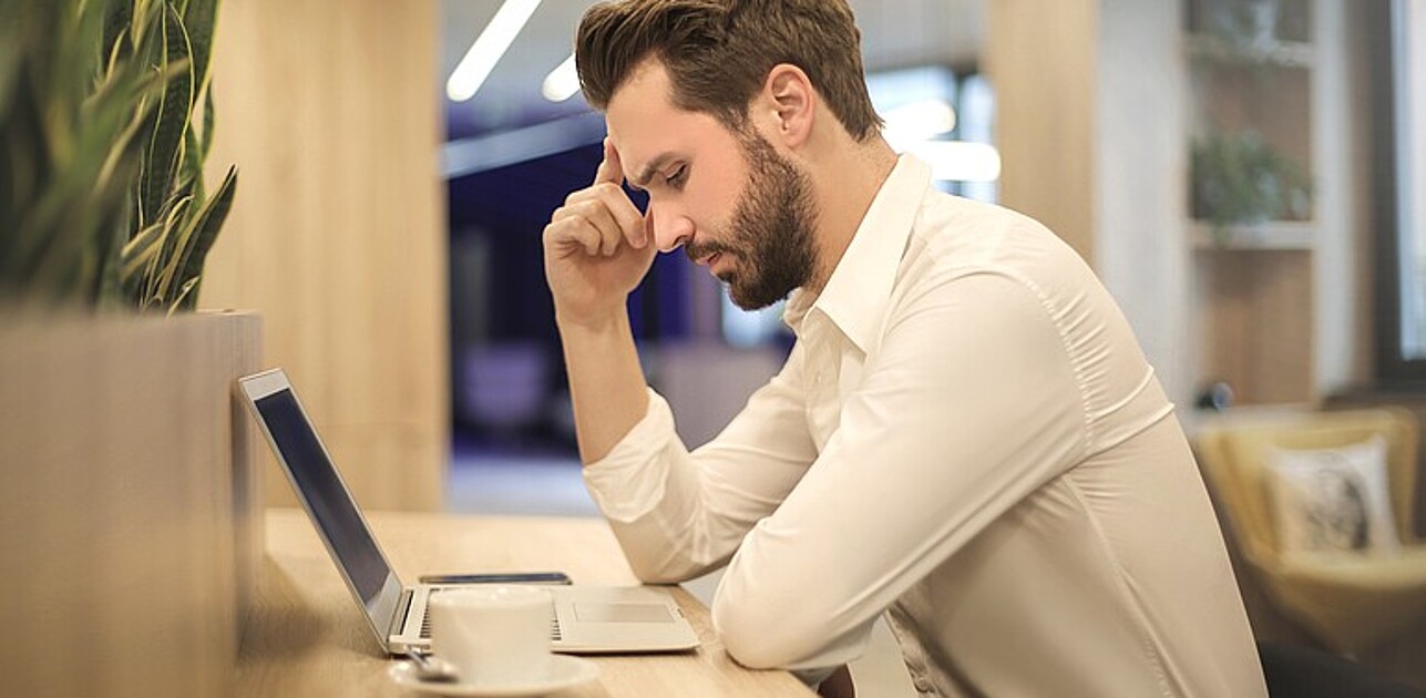 Man sitting in front of computer