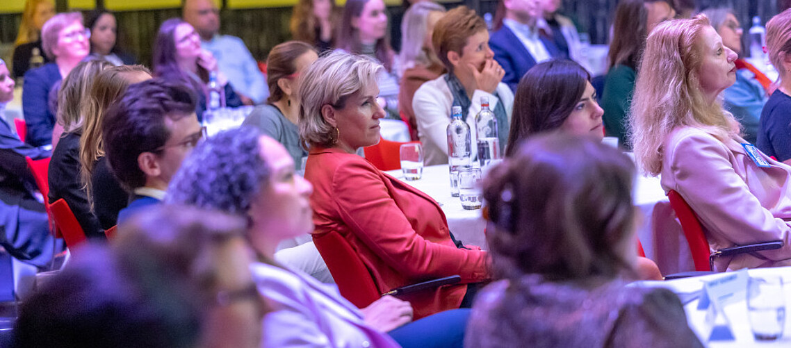 The audience observes thought-provoking presentations at ECWO conference